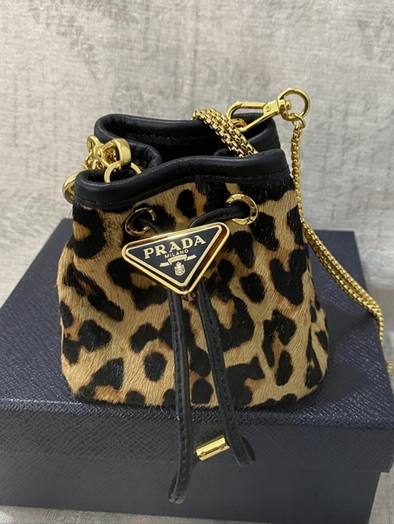 Meet the Posher Handbags - Prada Leopard Print Bucket Bag